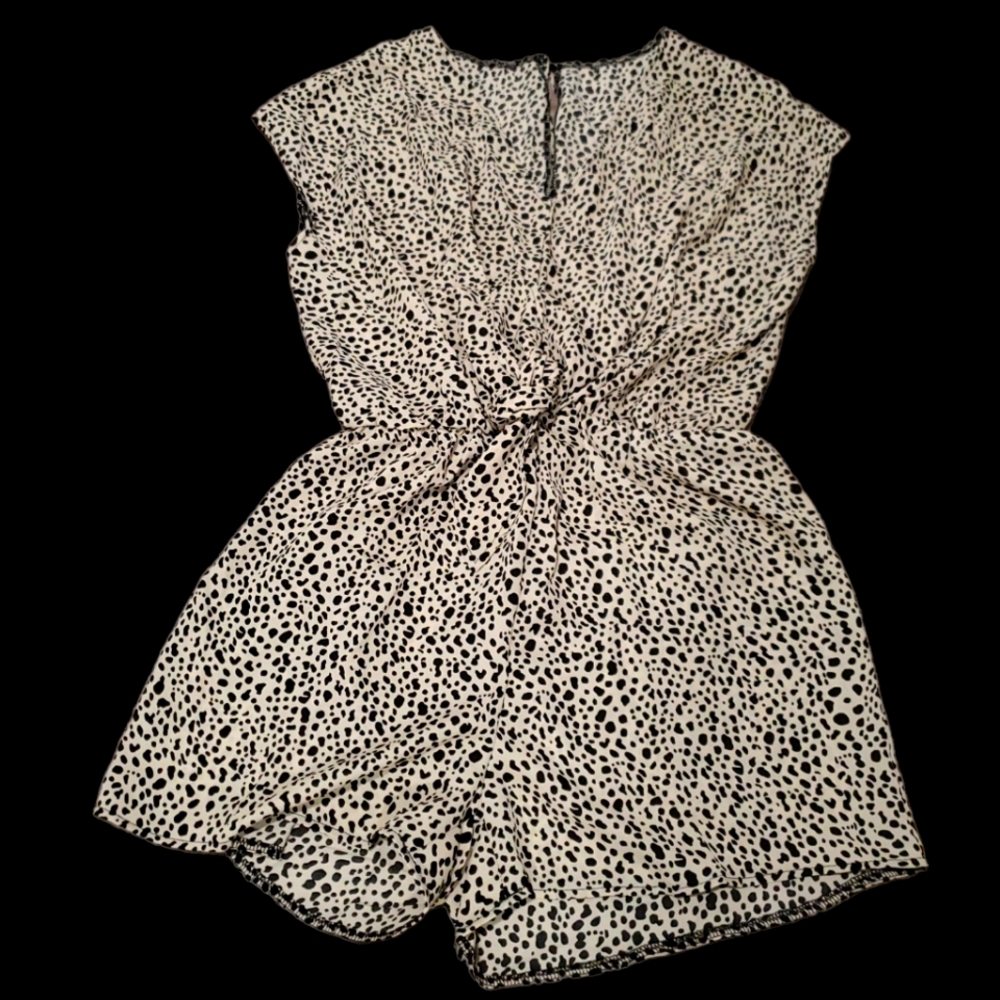 Shorts, romper, Animal patterns, beige color and black.